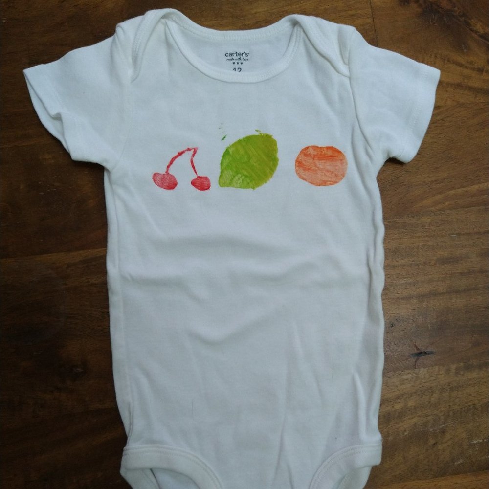 Fruit onesie: hand-decorated with cherries, lemon, orange